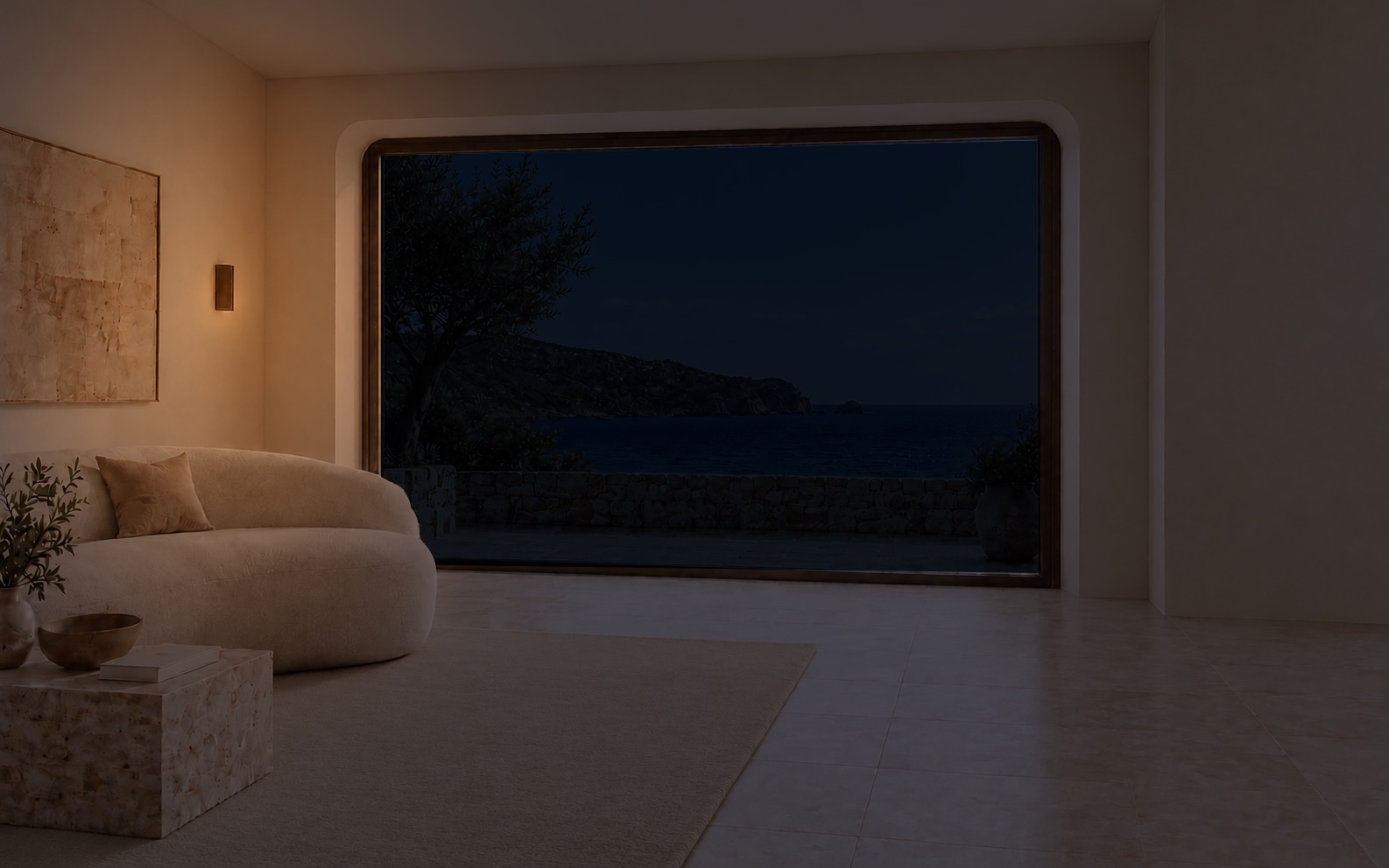 Aegean Quiet at night, lit by the warm wall lamp